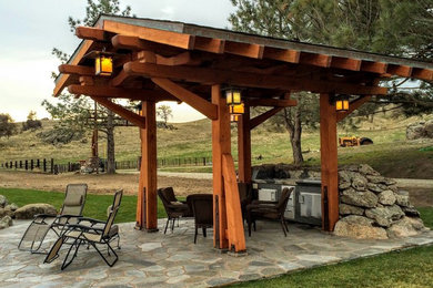 Example of a classic patio design in Other