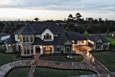 Tuscan exterior home photo in Houston