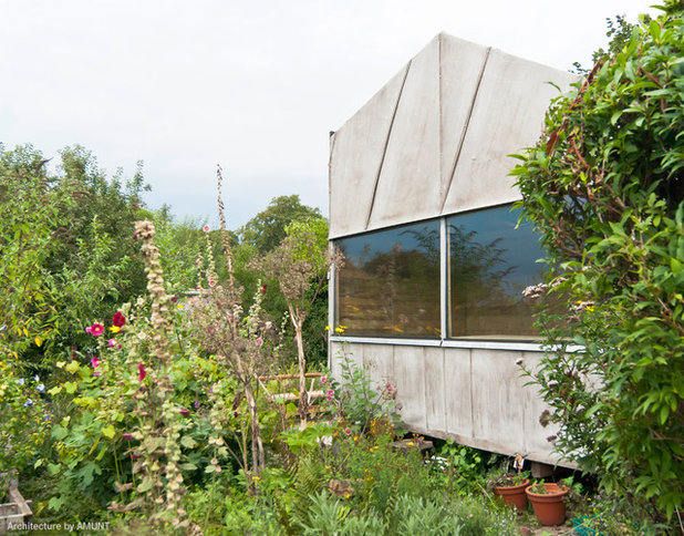 Modern Garten by AMUNT Architekten