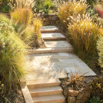Travertine Steps with Rock Retaining Walls