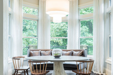 Transitional dining room in Portland with white walls and dark hardwood floors.