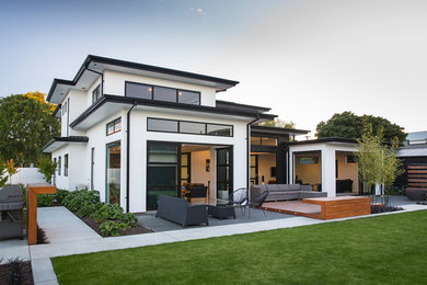 Inspiration for a mid-sized contemporary backyard patio in Christchurch with concrete slab.