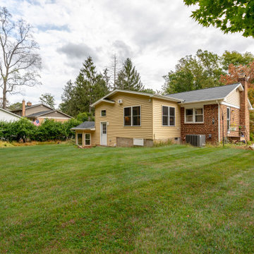Cheerful Multi Level Rear Addition to Expand Kitchen, Mudroom & Sunroom in Oakt