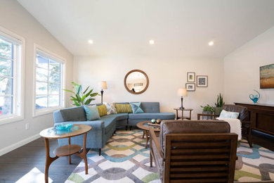 Mid-sized 1960s formal and enclosed dark wood floor and brown floor living room photo in Calgary with gray walls, no fireplace and no tv
