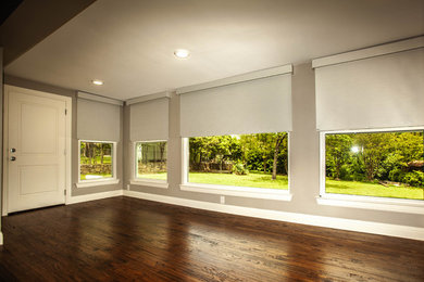 Living room - mid-century modern open concept dark wood floor and brown floor living room idea in Dallas with no tv