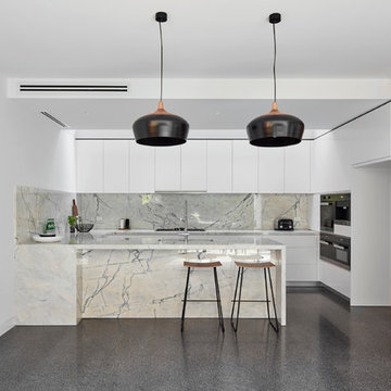 Waltham Jewel - Kitchen / Dining with concealed pantry door in timber wall