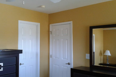 Example of an eclectic home design design in Other