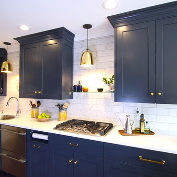 Custom Blue Cabinetry in Modern Galley kitchen