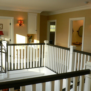 Upstairs balcony with Walnut handrail.