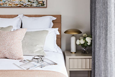 This is an example of a mid-sized modern bedroom in Melbourne.