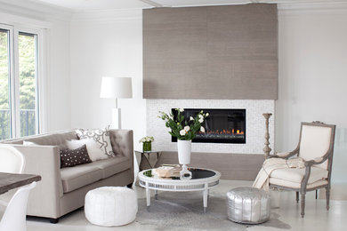 Design ideas for a contemporary living room in Vancouver with a tile fireplace surround.