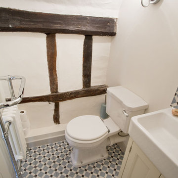 Traditional family bathroom and ensuite in Grade II listed cottage, Lindfield