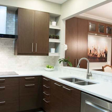 Builder kitchen becomes cool Contemporary Kitchen