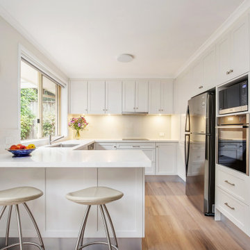 Kitchen with Amara bench tops