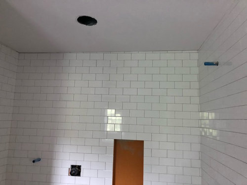 Is This Acceptable For A Professional Tile Job - Tiling A Wall With An Uneven Ceiling