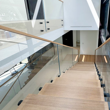 Project #126 | Contemporary Staircases with Integrated LEDs & Glass Railing