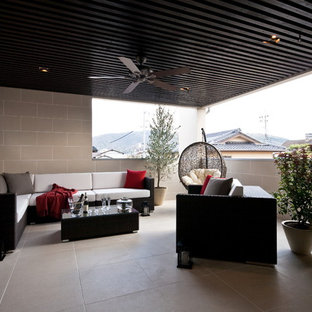 東京都下のコンテンポラリースタイルのおしゃれなテラス・中庭 (張り出し屋根) の写真