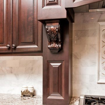 Dark Brown Kitchen with White Island