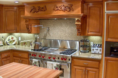 Inspiration for a huge timeless u-shaped porcelain tile open concept kitchen remodel in Orange County with raised-panel cabinets, medium tone wood cabinets, granite countertops, beige backsplash, stone slab backsplash, stainless steel appliances and an island