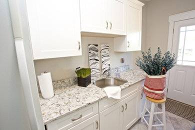 Elegant laundry room photo in Other