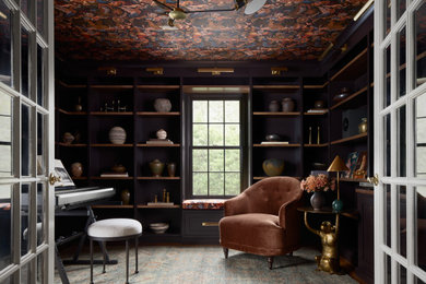 Family room - transitional medium tone wood floor and brown floor family room idea in Philadelphia with black walls
