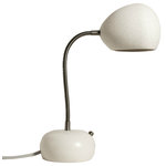Lightexture - Porcupine Desk Lamp, White, Dot Pattern - This porcupine shaped ceramic desk lamp emits a downwards task light and light textures around it. It has a touch dimmer knob on its base that activates with a short touch and dims it with a long touch.