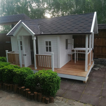 Custom Playhouse with Covered Game Terrace – Crane-Delivered