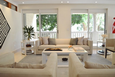 Large trendy formal and open concept white floor living room photo in Miami with white walls, no fireplace and no tv
