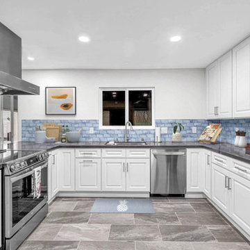 Kitchen Remodel with Blue Textured Backsplash and Modern Appliances