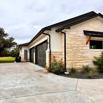 Black seamless gutter installation - Custom home in Georgetown, Texas