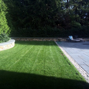 Pool deck, wall and cobble stone border