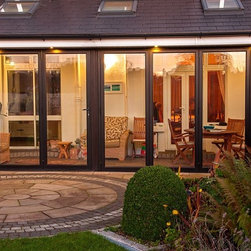 Fairco's bi-folding doors on a conservatory - Patio Doors & Bi-fold Doors