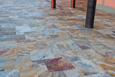Minimalist backyard stone patio photo in Boise