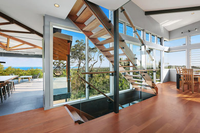 Design ideas for a large contemporary staircase in Sunshine Coast.