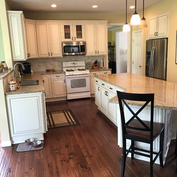 cabinet refacing--antique white with brown glaze, new backsplash