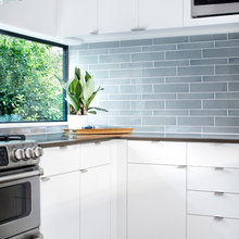 Cabinet fronts, door openers, color of tile & thin dark counters lighti