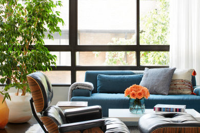 Inspiration for a mid-sized contemporary open concept dark wood floor and brown floor living room remodel in Toronto with white walls