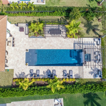 Straight Edge Pool in Parkland Florida with Custom Pergola and Tile