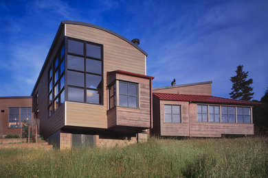 Photo of a contemporary exterior in San Francisco with wood siding.