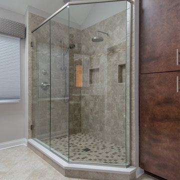 Full Length Glass Walls with Dual Rain Shower Fixtures and Built-In Shower Bench