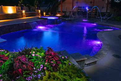Inspiration for a contemporary pool remodel in Kansas City