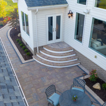Medina Structure, Fireplace, Unilock Patio and Landscaping