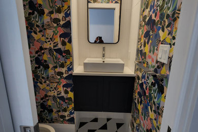 Powder room photo in Toronto