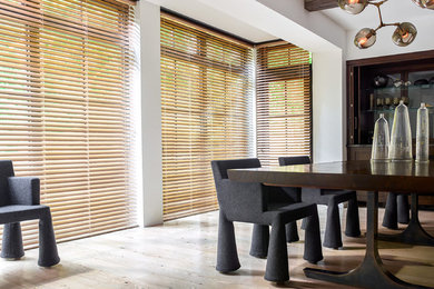 Example of a trendy dining room design