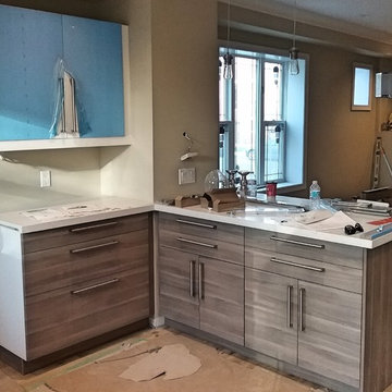 U-shape. VOXTORP walnut effect (base) & RINGHULT white high - gloss (wall)