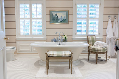 Inspiration for a mid-sized contemporary master mosaic tile floor bathroom remodel in St Louis with a two-piece toilet and beige walls