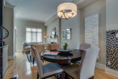 Small elegant light wood floor and beige floor great room photo in Toronto with gray walls and no fireplace