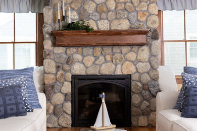 Beach style living room photo in Boston