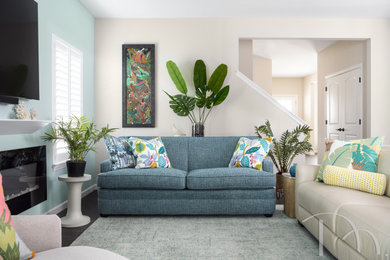 Living room - tropical living room idea in St Louis