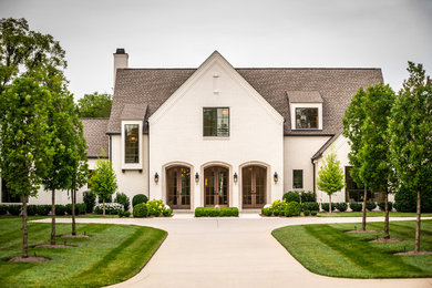 Example of a french country home design design in Nashville